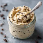 Protein Cookie Dough: The Ultimate Guide for Clean Snacking 7 Protein cookie dough in a jar with a spoon